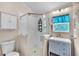 Clean bathroom with a walk-in shower and modern vanity at 2881 St George Dr, Davenport, FL 33837