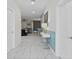 Bright entryway with marble-look tile and contemporary decor at 1158 Drop Ln, Davenport, FL 33896
