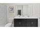 Bathroom with double vanity and walk-in shower at 1158 Drop Ln, Davenport, FL 33896