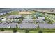 Aerial view of community parking lot adjacent to pool and clubhouse at 1158 Drop Ln, Davenport, FL 33896