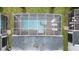 Overhead view of private pool and spa with screened enclosure at 1158 Drop Ln, Davenport, FL 33896