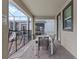 Covered patio with dining table and chairs, pool view at 1158 Drop Ln, Davenport, FL 33896