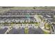 Wide aerial view of the house and surrounding neighborhood at 1158 Drop Ln, Davenport, FL 33896