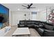 Game room with sectional sofa and large TV at 1158 Drop Ln, Davenport, FL 33896