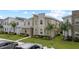 Modern two-story home with stone accents and landscaping at 1158 Drop Ln, Davenport, FL 33896