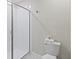 Clean bathroom with shower and toilet at 1158 Drop Ln, Davenport, FL 33896