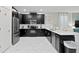 Modern kitchen with stainless steel appliances and an island at 1158 Drop Ln, Davenport, FL 33896