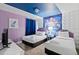 Charming bedroom with twin beds, Frozen mural, and soft lighting at 1158 Drop Ln, Davenport, FL 33896