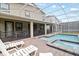 Inviting pool area with patio and lounge chairs at 1158 Drop Ln, Davenport, FL 33896