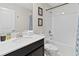 Clean bathroom with a bathtub and shower at 1158 Drop Ln, Davenport, FL 33896