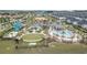 Aerial view of community pool and amenities at 1158 Drop Ln, Davenport, FL 33896