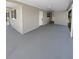 Covered back porch with concrete flooring and exterior access at 260 Pineview Dr, Oviedo, FL 32765