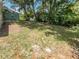 Large backyard with mature trees and grassy area at 260 Pineview Dr, Oviedo, FL 32765
