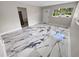 Bright and spacious living area with marble-look tile floors at 260 Pineview Dr, Oviedo, FL 32765