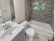 Updated bathroom with a tub, shower, and attractive tile at 260 Pineview Dr, Oviedo, FL 32765