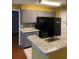 Modern kitchen with black appliances and gray cabinets at 1065 Hiawassee Rd # 1427, Orlando, FL 32835