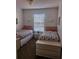 Bedroom with two twin-size beds at 1107 Park Ridge Cir, Kissimmee, FL 34746