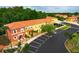 Aerial view of building exterior and parking lot at 1107 Park Ridge Cir, Kissimmee, FL 34746