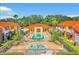 Aerial view showing resort-style pool and playground at 1107 Park Ridge Cir, Kissimmee, FL 34746