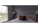Bedroom with queen-size bed and window at 1107 Park Ridge Cir, Kissimmee, FL 34746
