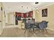 Kitchen and dining area with modern pendant lighting at 1214 Chelsea Dr, Davenport, FL 33897