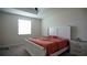 Spacious bedroom with a large bed and window at 4832 Tribute Trl, Kissimmee, FL 34746