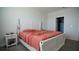 Bright bedroom featuring a comfortable bed and closet at 4832 Tribute Trl, Kissimmee, FL 34746