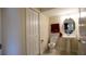 Simple bathroom with toilet and pedestal sink at 4832 Tribute Trl, Kissimmee, FL 34746