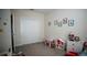 Well-lit bedroom with closet and dresser at 4832 Tribute Trl, Kissimmee, FL 34746