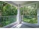 Private balcony overlooking lush green trees at 4368 S Kirkman Rd # 212, Orlando, FL 32811