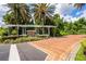 Community entrance with brick road and pergola at 4368 S Kirkman Rd # 212, Orlando, FL 32811