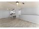 Open kitchen with white cabinets and a breakfast bar at 4368 S Kirkman Rd # 212, Orlando, FL 32811