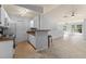 Open kitchen with granite countertops and white cabinetry at 4368 S Kirkman Rd # 212, Orlando, FL 32811