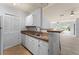 Kitchen features granite countertops and white cabinets at 4368 S Kirkman Rd # 212, Orlando, FL 32811