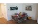 Bright dining area with a table for four and hardwood floors at 462 Hamlet Loop, Davenport, FL 33837