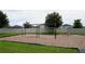 Playground area featuring swings and climbing structures for children at 462 Hamlet Loop, Davenport, FL 33837