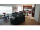 Open living area with kitchen, living room and dining area at 462 Hamlet Loop, Davenport, FL 33837