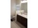 Main bathroom with double sinks and a toilet at 462 Hamlet Loop, Davenport, FL 33837