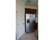 Modern kitchen with stainless steel appliances and pantry at 462 Hamlet Loop, Davenport, FL 33837