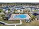 Aerial view of community pool and surrounding houses at 462 Hamlet Loop, Davenport, FL 33837