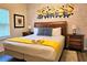 Bedroom with king-size bed, Minions mural, and nightstands at 5354 Diplomat Ct # 105, Kissimmee, FL 34746