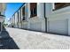 Modern townhomes with attached garages and a shared paved courtyard at 38 W Harding St # B, Orlando, FL 32806