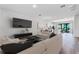 Open living area featuring contemporary furniture and hardwood floors at 38 W Harding St # B, Orlando, FL 32806