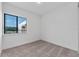 Small bedroom with window and neutral decor at 38 W Harding St # B, Orlando, FL 32806