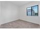 Well-lit bedroom with window and neutral decor at 38 W Harding St # B, Orlando, FL 32806