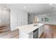 Modern kitchen island with white quartz countertop and stainless steel dishwasher at 42 W Harding St # B, Orlando, FL 32806
