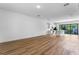 Expansive living room with hardwood floors and modern lighting at 42 W Harding St # B, Orlando, FL 32806