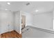 Upstairs hallway with access to bathroom and additional rooms at 42 W Harding St # B, Orlando, FL 32806