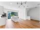 Open concept living space with kitchen and balcony access at 42 W Harding St # B, Orlando, FL 32806