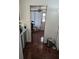 Kitchen with dark laminate flooring, and access to laundry area at 2012 Vincent Rd, Orlando, FL 32817